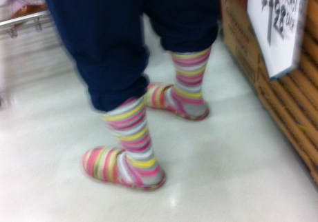 close up of public slippers stripes